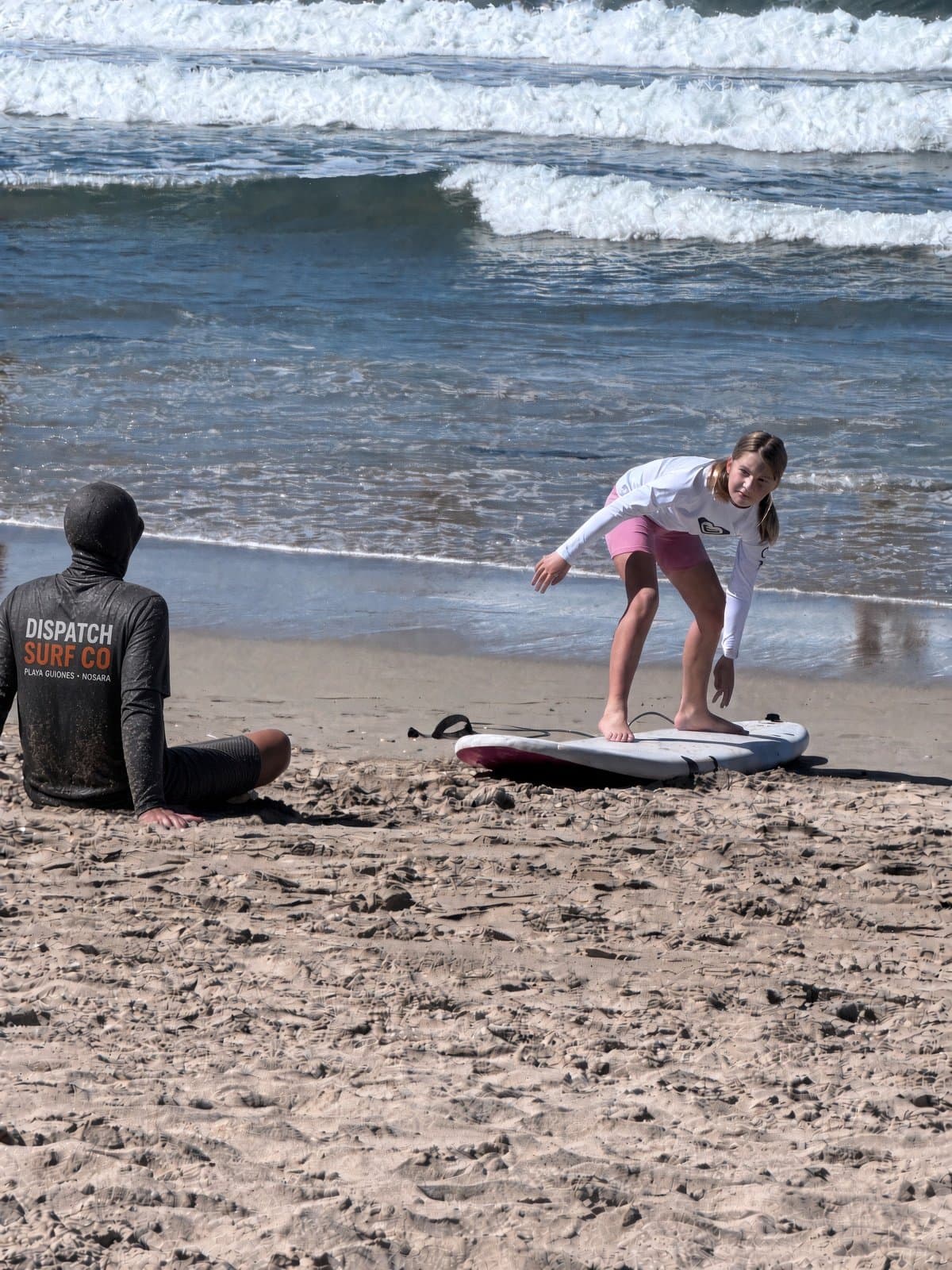 Practicing the pop-up on the sand.
